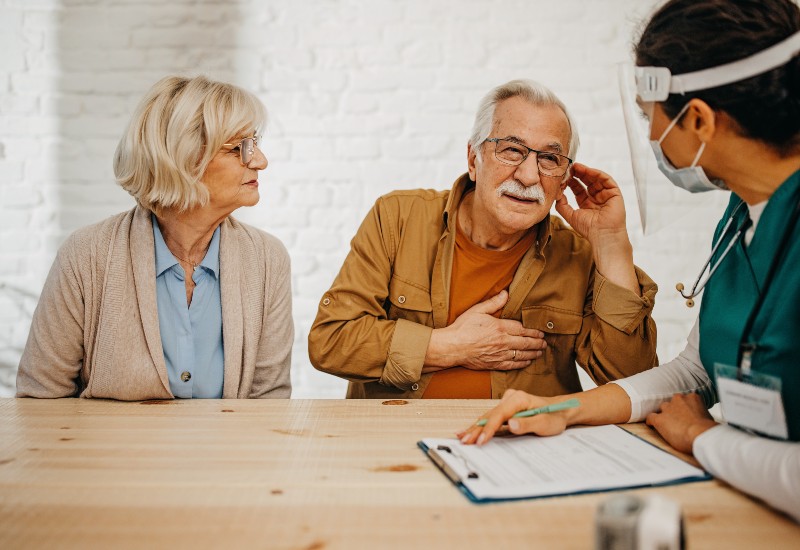 An Elderly Couple at Castle Rock Ear Associates Examining Hearing Loss in Castle Rock, CO
