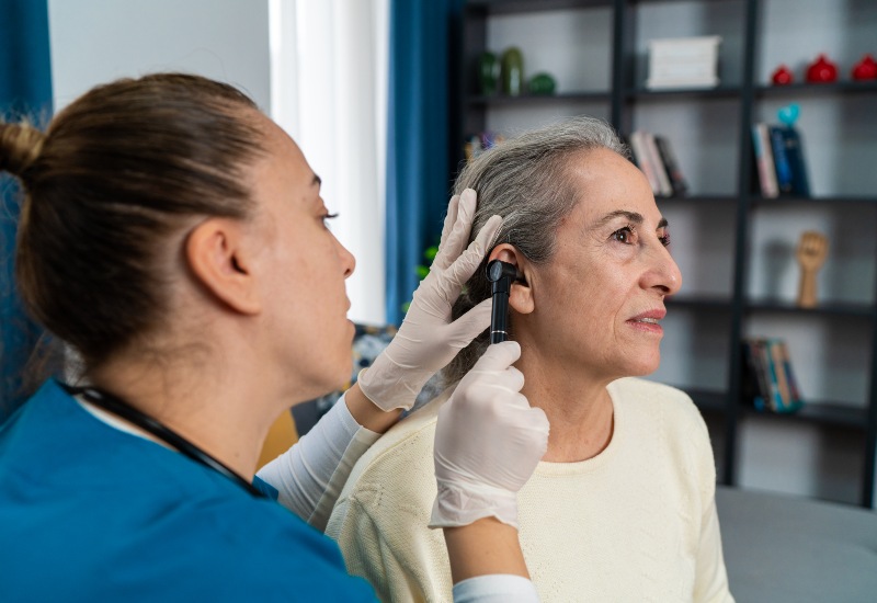 Castle Rock Ear Associates Consulting Doctor Examining a Patient's Ear in Castle Rock, CO