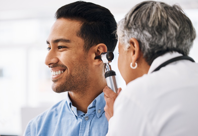 Doctor Examining a Patient for Ear Wax Removal in Castle Rock, CO
