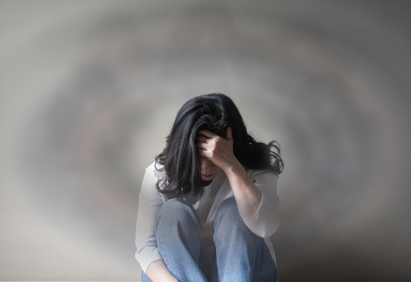 A Woman Suffering from Benign Paroxysmal Positional Vertigo in Castle Rock, CO